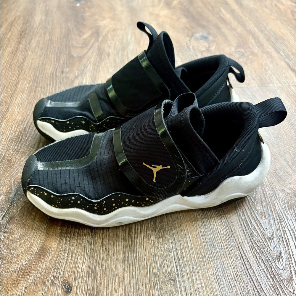 Black and Gold Nike Jordan 23/7